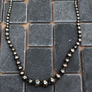 Black and gold metallic bead necklace